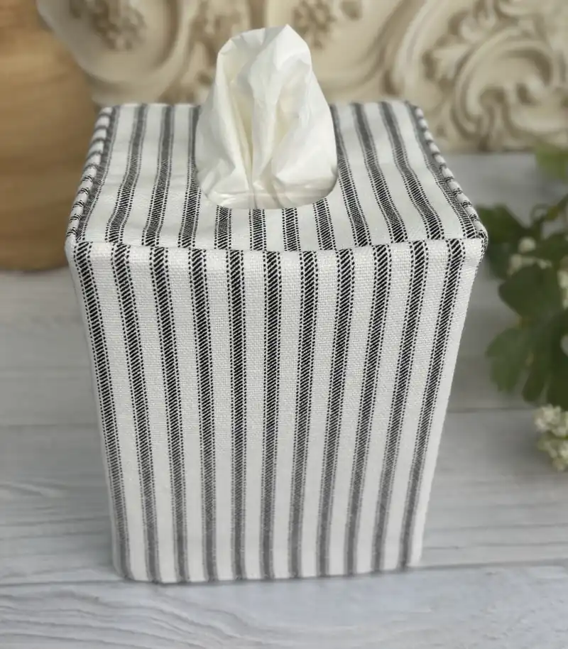 Black stripe ticking tissue box cover close-up top view showing fabric detail and construction