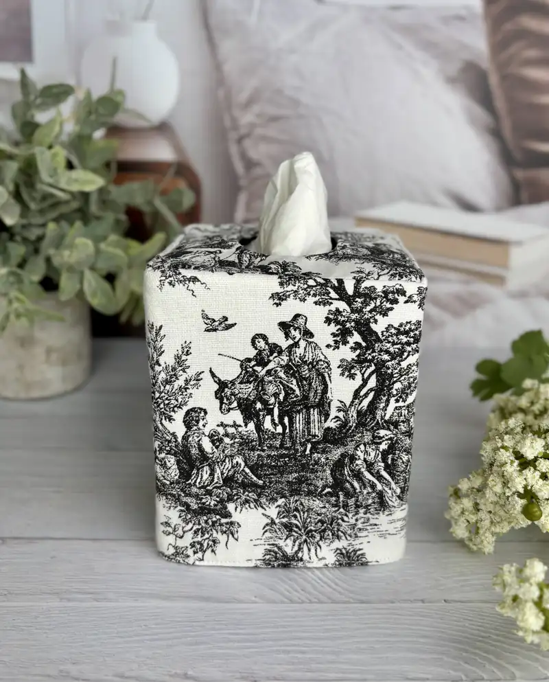Black toile tissue box cover front view showing detailed French pastoral countryside scene handmade