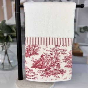 Red toile hand towel with ticking stripe trim on black towel stand handmade decorative bathroom towel