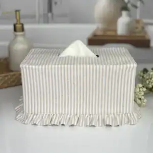 Natural stripe ruffle rectangle tissue box cover front view with tissue showing