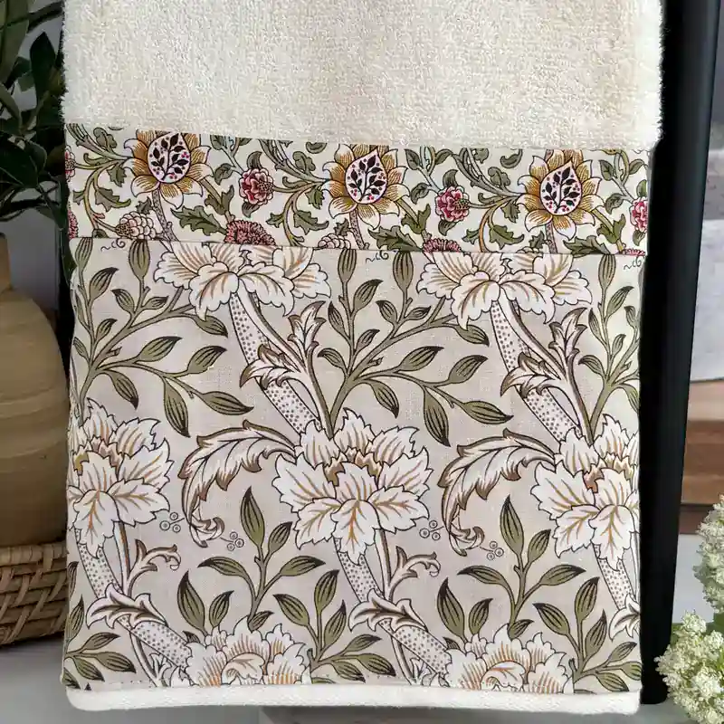 Handmade decorative bathroom hand towel in cream with a vintage leaf and berry print border, a pretty hostess gift