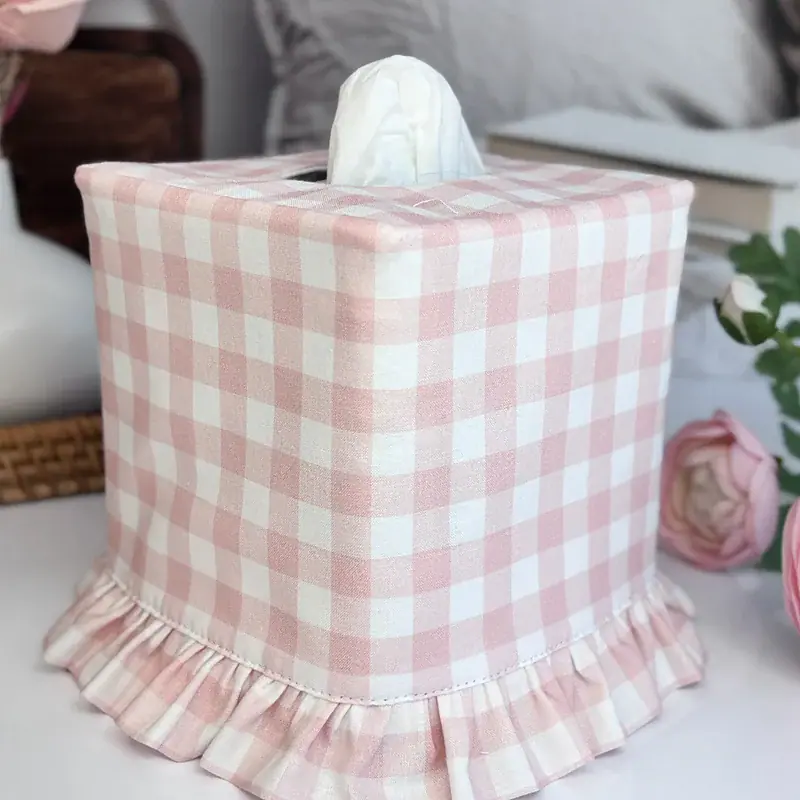 Coquette style pink check tissue box cover with a white bow, sweet nursery and vanity decor